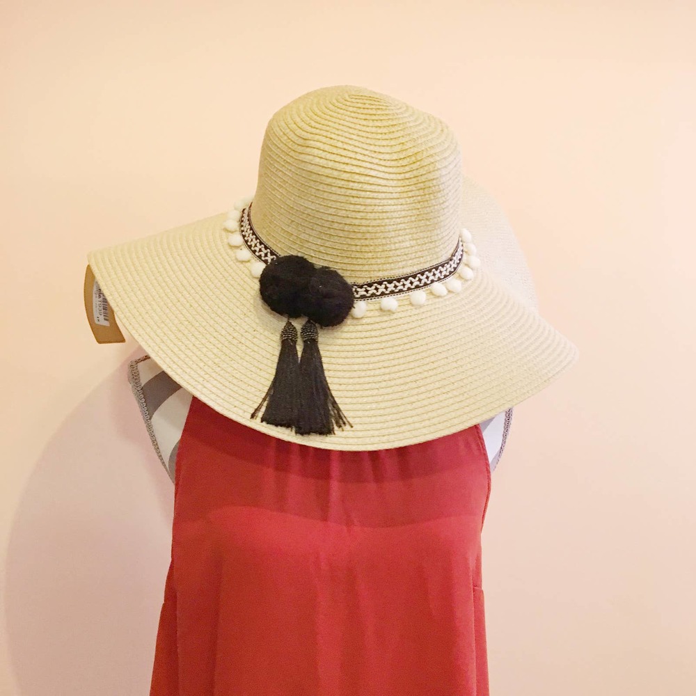 Woven wide brim oversized sun hat with poms and tassels synthetic straw